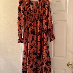 Orange and Black Smocked Long Sleeve Sundress